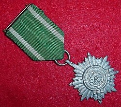 Nazi "Ostvolk" Eastern People's Medal 2nd Class with Swords and Marked Ring...$70 SOLD