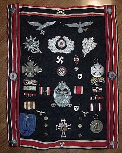 WWII Soldier's Display of German War Souvenirs on Felt Cloth Section...$850 SOLD